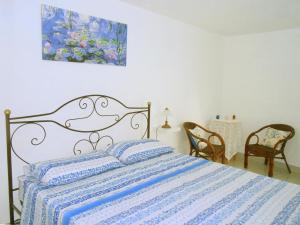 Postel nebo postele na pokoji v ubytování B&B Il Patio