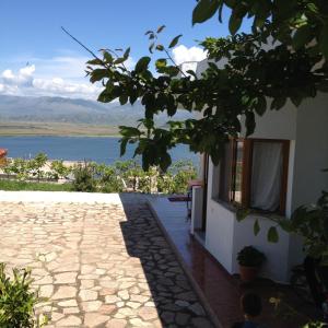 a house with a view of the water at Villas Ermali in Ksamil