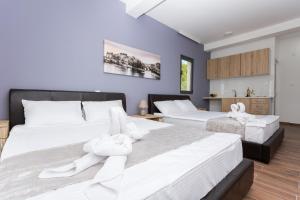 Postel nebo postele na pokoji v ubytování Resort Bevilacqua + 37 fotografií