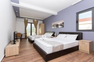 Katil atau katil-katil dalam bilik di Resort Bevilacqua