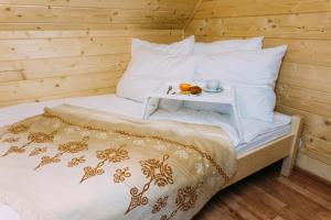 Llit o llits en una habitació de Domki u Huberta