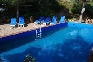 The swimming pool at or close to Masia El Canalot - Molí Del Pont