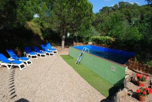 The swimming pool at or close to Masia El Canalot - Molí Del Pont