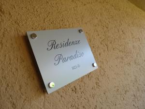 a sign on a wall that reads resistance panderittle at Residenze Paradiso in Costa Paradiso