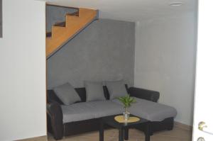 Część wypoczynkowa w obiekcie Petros Room Camere