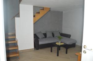 Część wypoczynkowa w obiekcie Petros Room Camere