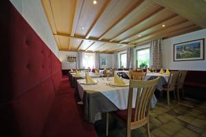 Restaurant ou autre lieu de restauration dans l'établissement Pensione Arnica
