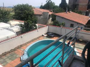 an overhead view of a swimming pool on a house at Guesthouse in Chernomorets next to Gradina and Sozopol in Chernomorets