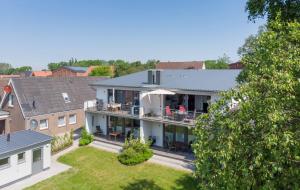 une vue aérienne sur une maison dans l'établissement Ferienwohnung Meeschendorf, à Fehmarn