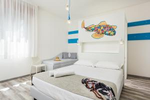 Postel nebo postele na pokoji v ubytování Hotel Albatros