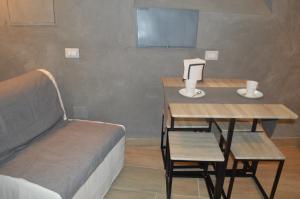 Telewizja i/lub zestaw kina domowego w obiekcie Petros Room Camere