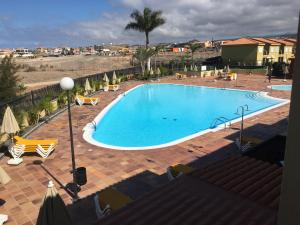 Bazén v ubytování Vivienda Las Velas nebo v jeho okolí