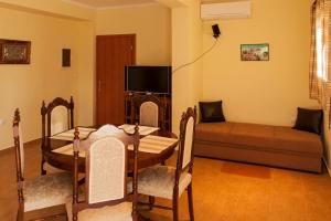 A television and/or entertainment centre at Ellinas Homes