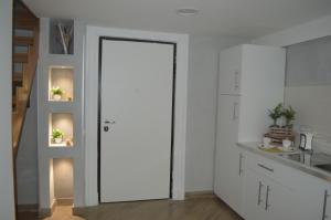 Kuchnia lub aneks kuchenny w obiekcie Petros Room Camere