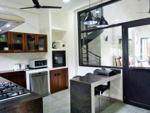 Nhà bếp/bếp nhỏ tại Tropical Dream Villa
