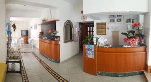 Kuchyň nebo kuchyňský kout v ubytování Hotel Luana