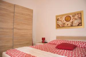 Letto o letti in una camera di B&B Myrta Maria