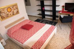 Letto o letti in una camera di B&B Myrta Maria