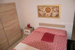 Letto o letti in una camera di B&B Myrta Maria