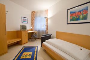 Postel nebo postele na pokoji v ubytování Hotel Haus Appel + 5 fotografií