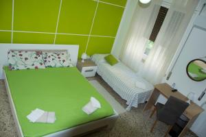 Letto o letti in una camera di B&B Myrta Maria