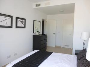 Postel nebo postele na pokoji v ubytování Apartamento con piscina + 16 fotografií