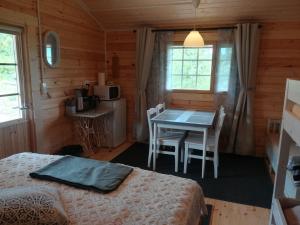 TV a/nebo společenská místnost v ubytování Tohninmäen Talo