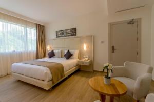 Postel nebo postele na pokoji v ubytování Hôtel Sidi Yahia