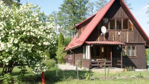Fotografia z galérie ubytovania Domek nad jeziorem v destinácii Majdy