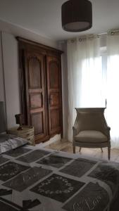 Postel nebo postele na pokoji v ubytování BASTIDE DE L' ORANGERAIE