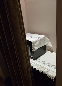 Cama ou camas em um quarto em Kitapevi Hotel