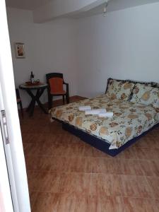 Postel nebo postele na pokoji v ubytování Apartments TODOR