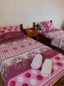 Postel nebo postele na pokoji v ubytování Apartments TODOR
