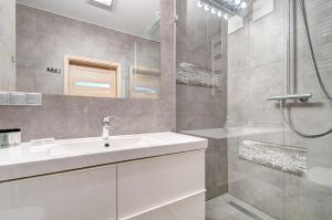 Kúpeľňa v ubytovaní Dom & House - Apartamenty Nadmorski Dwór