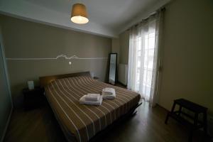 Posteľ alebo postele v izbe v ubytovaní V&V Central & Elegant Apartment