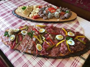 two plates of food sitting on top of a table at Gasthof Wadl in Feldkirchen in Kärnten
