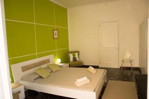 Letto o letti in una camera di B&B Myrta Maria