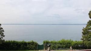 a view of the water from the house at Appartamenti Villa Andrea in Garda