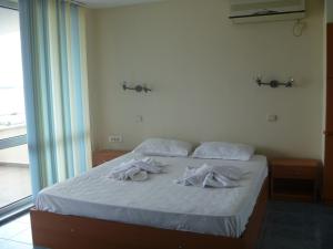 Кровать или кровати в номере Apartments Lucky Complex Ravda