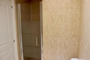 A bathroom at Beautiful Ocean View Apartment