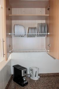 A kitchen or kitchenette at Beautiful Ocean View Apartment