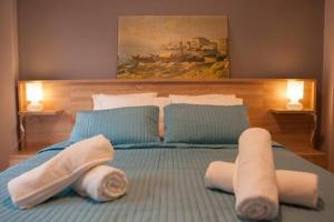 Ένα ή περισσότερα κρεβάτια σε δωμάτιο στο Modern Central Apartment