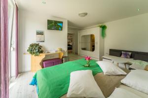 Postel nebo postele na pokoji v ubytování Aparthotel Pr' Jakapč'