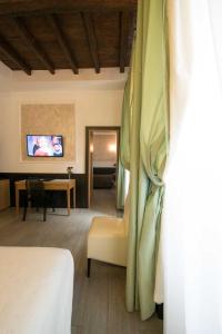 A television and/or entertainment centre at DK Suites