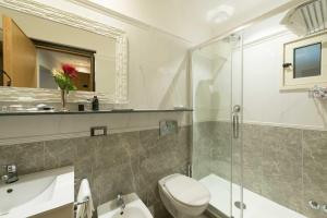 A bathroom at DK Suites