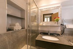 A bathroom at DK Suites