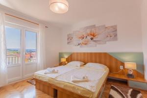 Postel nebo postele na pokoji v ubytování Guesthouse Maver