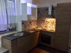 Kuchyň nebo kuchyňský kout v ubytování LOFT Marcantoni
