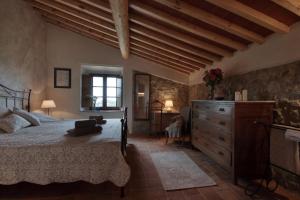 Cama ou camas em um quarto em Podere Ripi mais 49 fotos