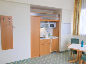 Kuchyň nebo kuchyňský kout v ubytování Hotel Birkenhof